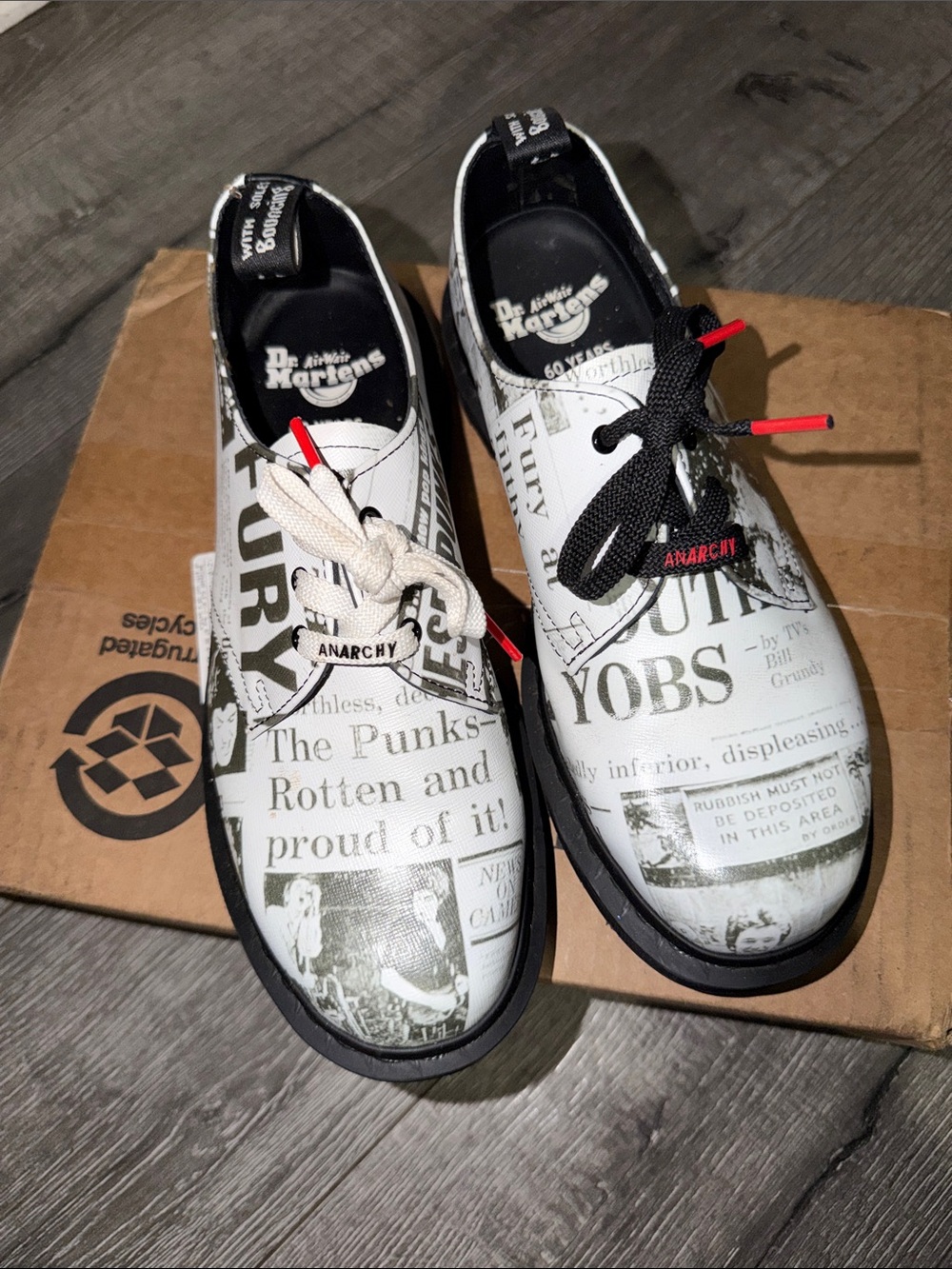Dr. Martens 1461 Newspaper Print White & Black Oxford Shoes with Red Accents